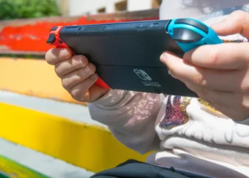 Picture of child playing a Nintendo Switcb