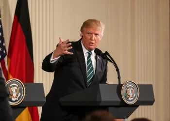 Trump speaking at a podium